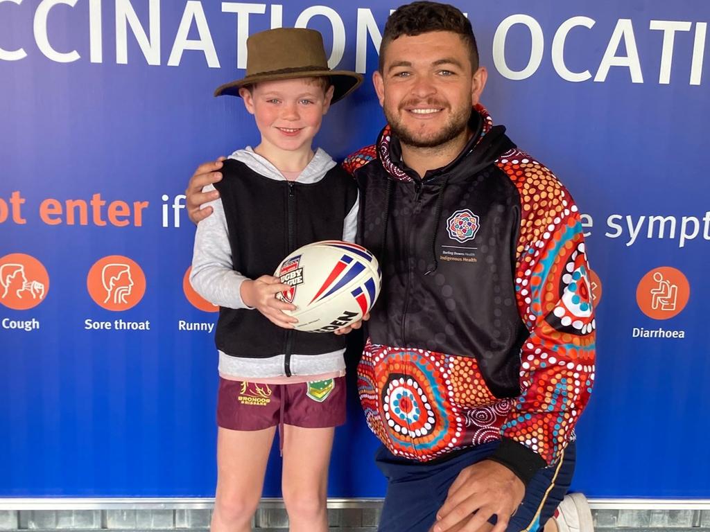 Former NRL star Ash Taylor with Toowoomba local Charlie Borchardt at the Clifford Gardens vaccination clinic. Taylor has joined Darling Downs Health to work with Indigenous health and community engagement at Covid-19 clinics and other projects.