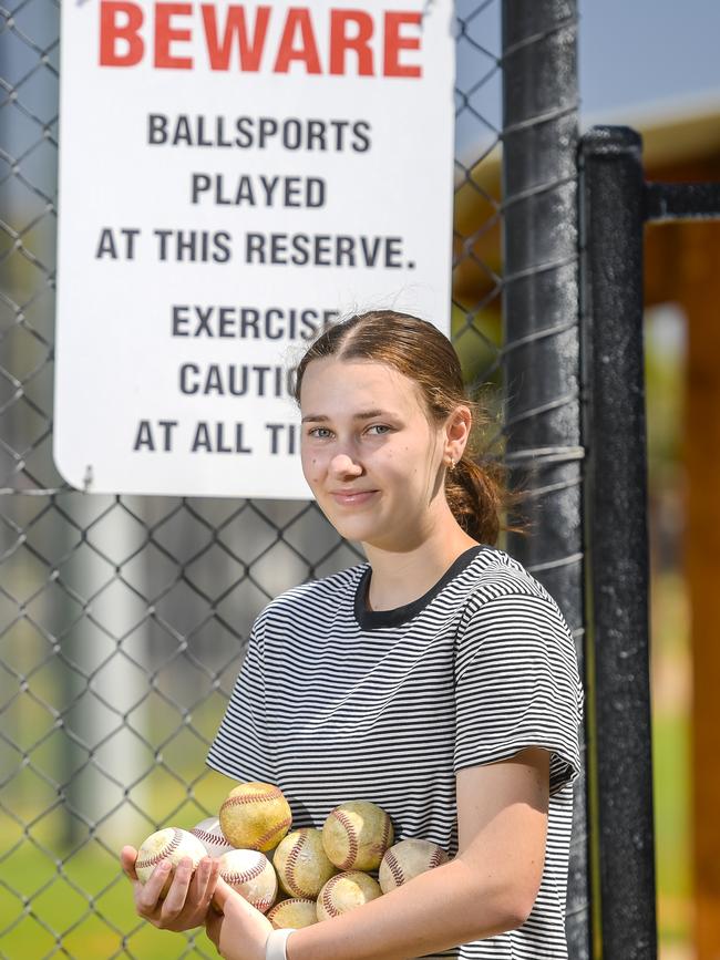 Scarlett Drogemuller and her sister have collected more than a dozen baseballs that have landed on their property. Photo: RoyVPhotography