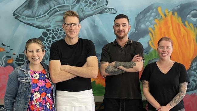 Hayley Maginness, James Maginness with staff members Jason and Danielle. Picture: Supplied