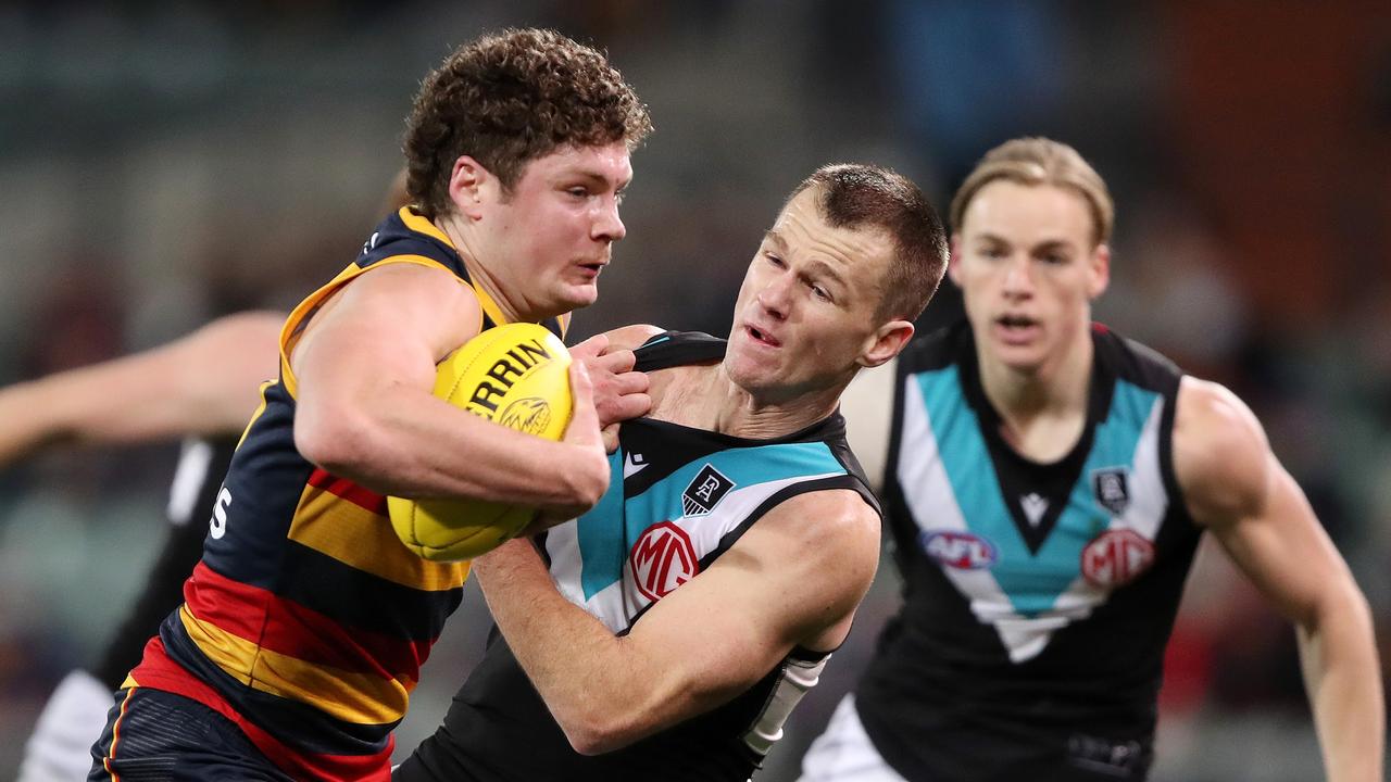 Harry Schoenberg and Robbie Gray will be facing off under Friday night lights in 2022. Picture: AFL Photos/Getty Images