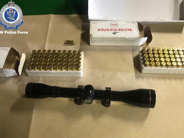 A rifle scope and ammunition rounds police allege were found at Faytrouni’s Lansvale home. Picture: NSW Police