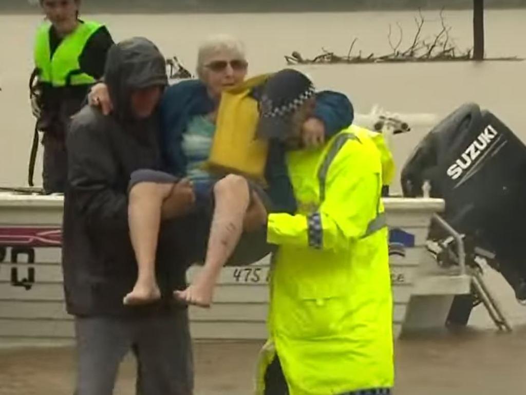 People are evacuated at Grantham after houses were submerged. Picture: 7 News Brisbane