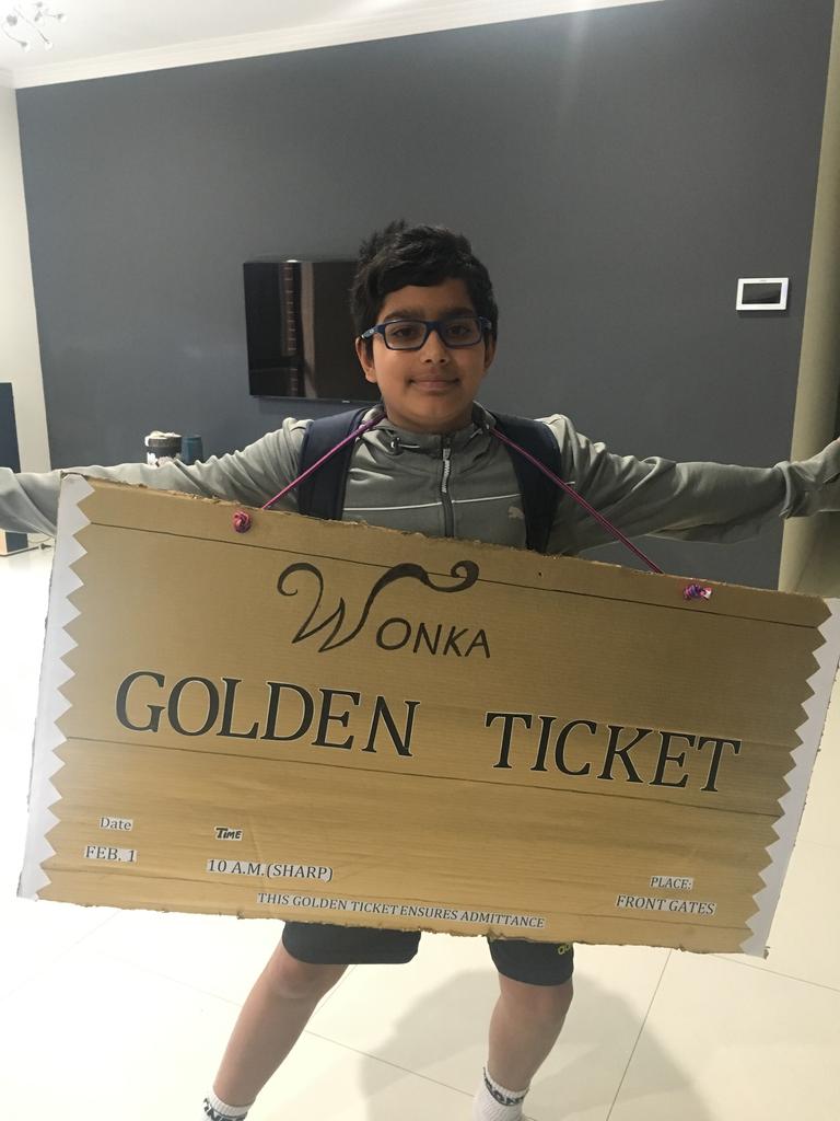 Gurbaz dressed as the Golden Ticket from Charlie and the Chocolate Factory.