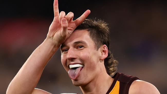 MELBOURNE, AUSTRALIA - JULY 20: Connor Macdonald of the Hawks celebrates kicking a goal during the round 19 AFL match between Hawthorn Hawks and Collingwood Magpies at Melbourne Cricket Ground on July 20, 2024 in Melbourne, Australia. (Photo by Graham Denholm/AFL Photos/via Getty Images)