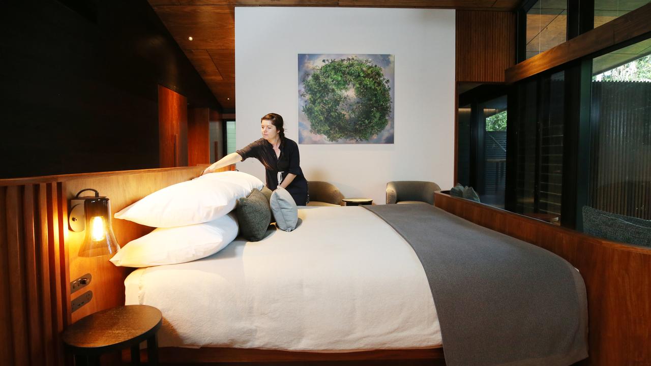 Silky Oaks Lodge at Finlayvale, north of Mossman, has undergone a renovation. The Daintree Pavillion is a brand new addition, and is the lodge's flagship accommodation at $5,000 per night. Silky Oaks Lodge duty manager Sarah Martin arranges the pillows on the king size bed in the Daintree Pavillion. Picture: Brendan Radke