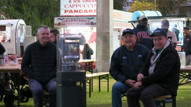 Dozen's braved the cold and rain to enjoy Territory Day at Anzac Oval in Alice Springs. Picture: Gera Kazakov