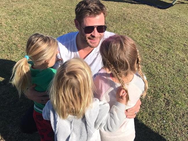 Chris Hemsworth pictured with his kids, who keep him grounded.