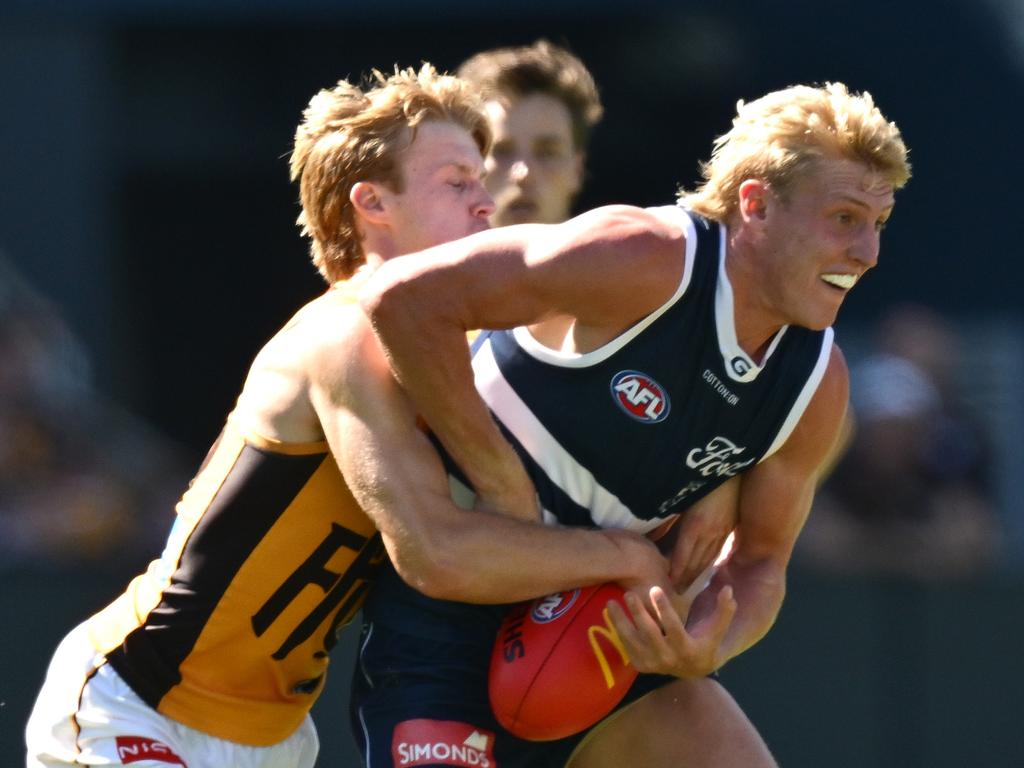 Mitch Knevitt is tackled by Cam Mackenzie. Picture: Getty Images