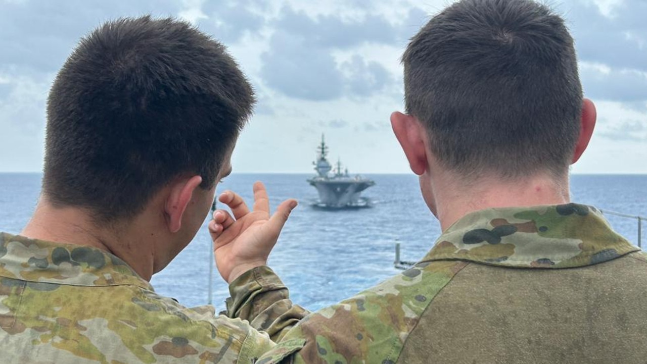 Australian Army aboard HMAS Canberra passing through the South China Sea with a Japanese aircraft carrier in convoy in October 2023. Picture: Charles Miranda