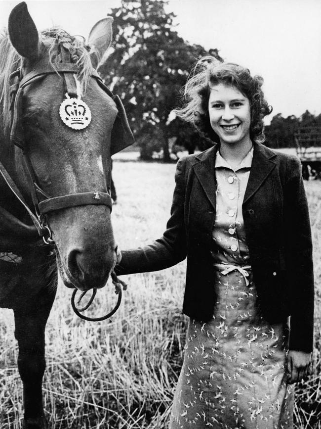 The then Princess Elizabeth at Sandringham with one of the horses. Picture: AFP