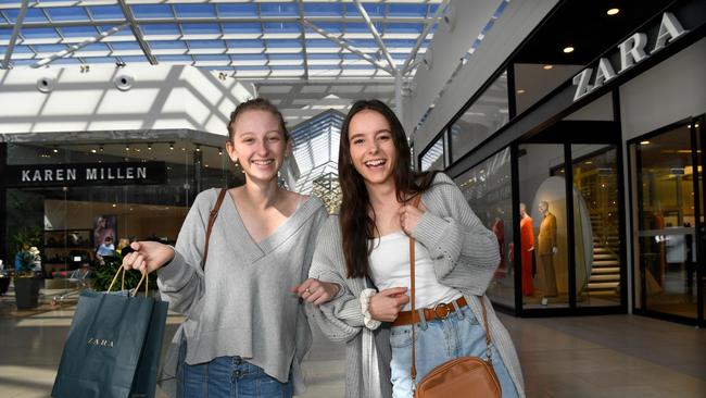 Friends Jazmin Wotton and Emma Toll are happy the shops are open on the AFL Grand Final public holiday. Picture: Tricia Watkinson