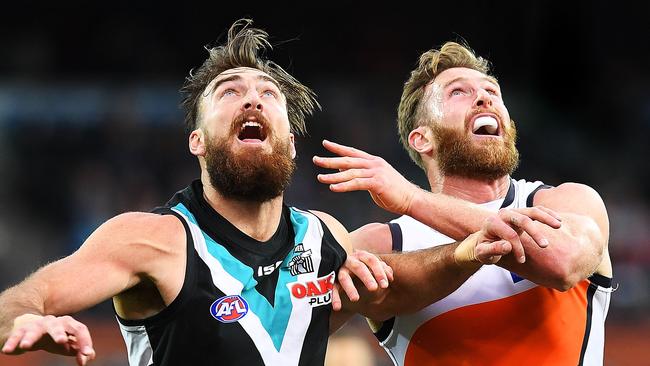 Charlie Dixon of Port Adelaide rucks against Dawson Simpson of the Giants during the round 18 AFL match at Adelaide Oval. Picture: Mark Brake/Getty Images