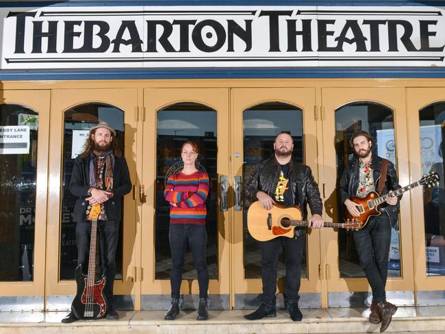 Musicians Trent Worley, Sean Kemp and Dusty Lee Stephensen with Thebby employee Amy Boman outside the Thebarton Theatre, Monday, July 08, 2019. (Pic: Brenton Edwards)