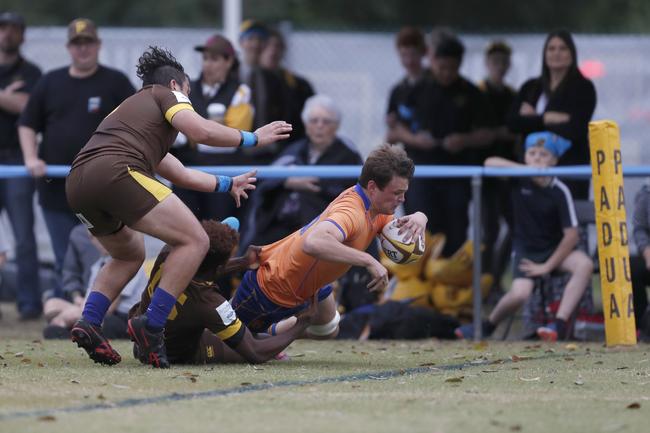 Nick Baker of Marist College Ashgrove scores a try against Padua College during the 2019 AIC First XV rugby season.