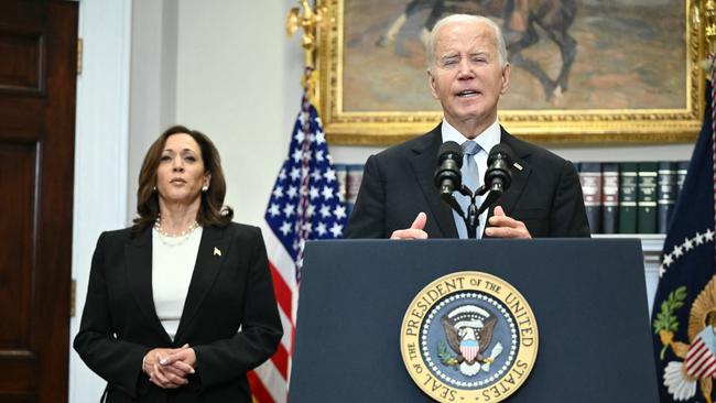 The President Joe Biden speaks from the Roosevelt Room of the White House as Vice President Kamala Harris looks on in Washington. Picture: AFP.