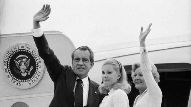 Richard Nixon, his wife Pat and daughter Tricia boarding plane after his resignation in 1974.