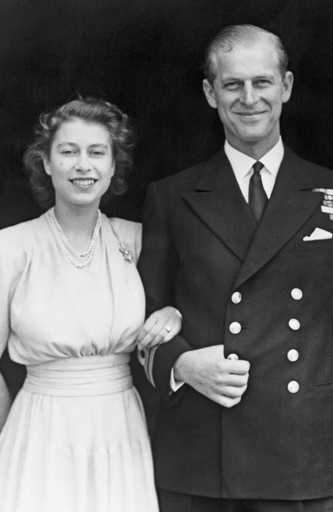 11th July 1947: Princess Elizabeth and Prince Philip, Duke of Edinburgh at Buckingham Palace, London shortly after they announced their engagement. (Photo by Fox Photos/Getty Images)