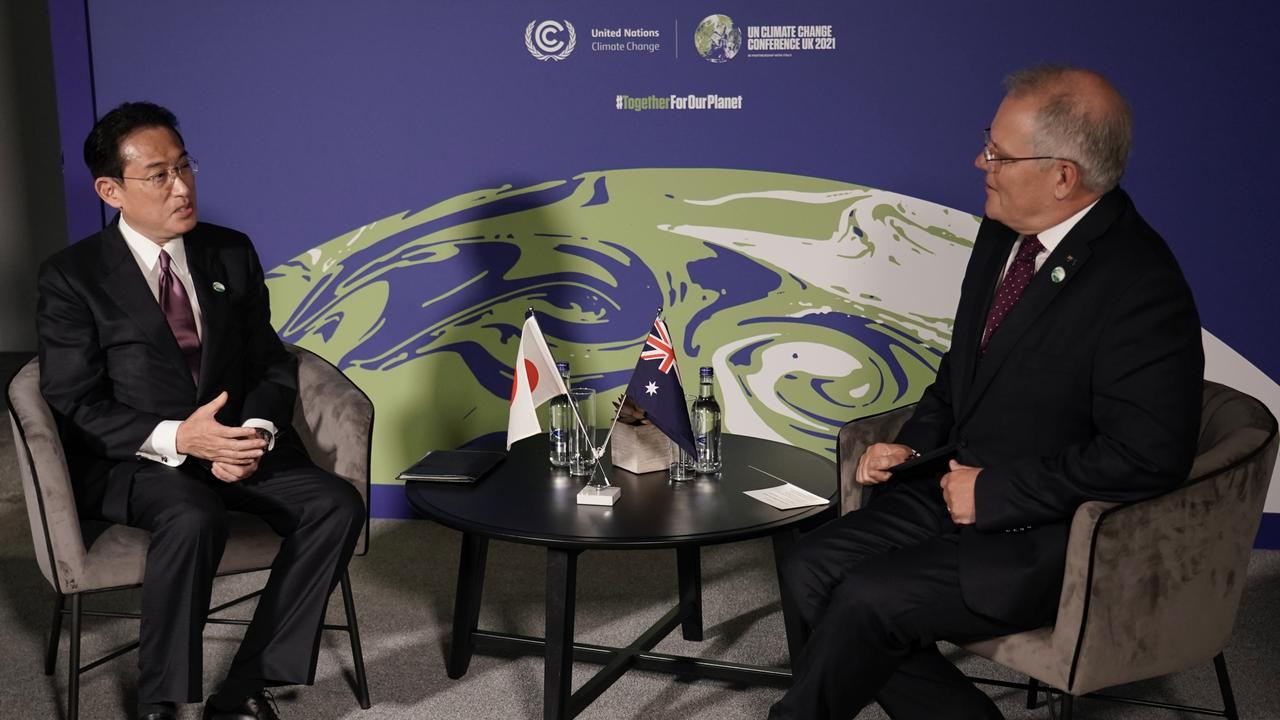 Prime Minister Scott Morrison (right) at the COP 26 Climate summit in Glasgow on November 2, 2021. Picture: Adam Taylor