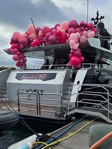 Bell’s yacht decked out with balloons.