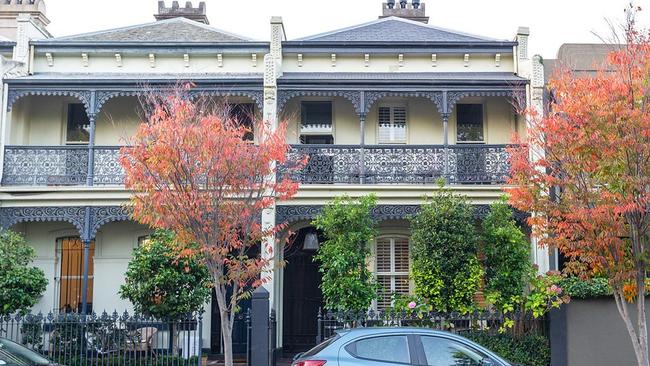 The East Melbourne house has formal living and dining rooms, a powder room and a contemporary open plan.