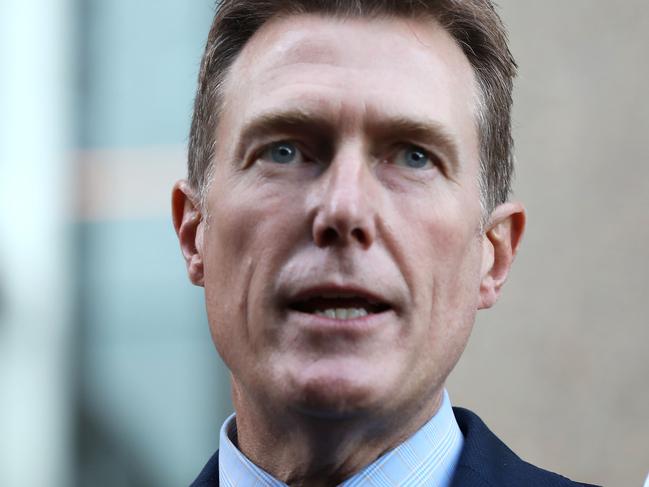 Christian Porter speaking at a press conference outside the Supreme Court after dropping his claims against the ABC for deformation. Jane Dempster/The Australian.