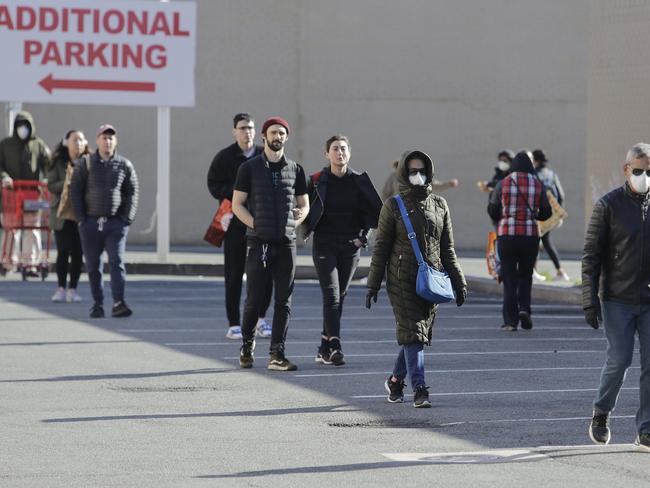 Patrons wait in line at a Trader Joe's location in the Queens borough of New York. Picture: AP