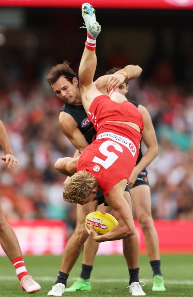 Heeney crashes back to earth after his hanger over Jack Buckley. Picture: Matt King/AFL Photos/via Getty Images