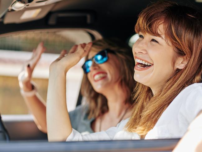 At Home 2023: April 1 issue, The Fixer, smells like teen spirit. Picture: iStockHappy excited pretty young woman waving with hands when riding in car