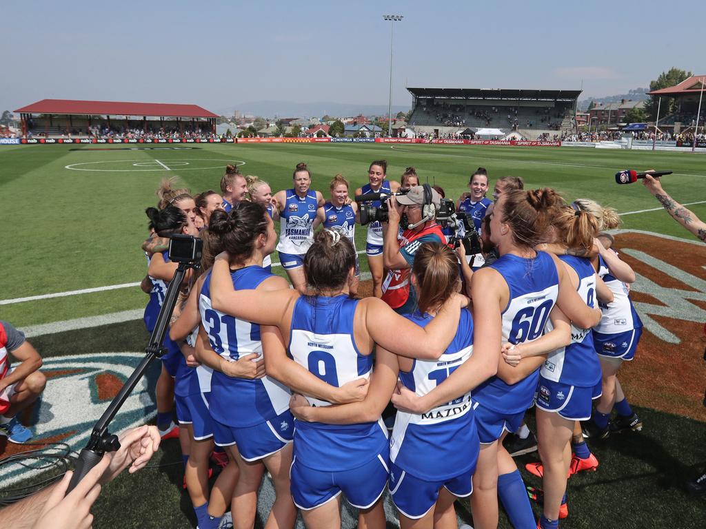 North Melbourne celebrates winning its first AFLW match, against Carlton at North Hobart Oval. Picture: LUKE BOWDEN