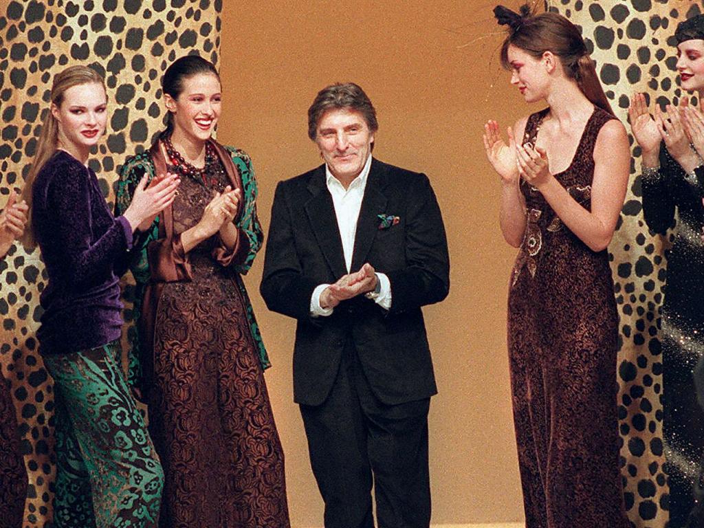 The designer after a show in 1997. He retired in 2005. Picture: AFP