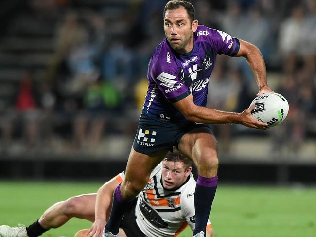 SUNSHINE COAST, AUSTRALIA - SEPTEMBER 19: Cameron Smith of the Storm looks to pass the ball during the round 19 NRL match between the Melbourne Storm and the Wests Tigers at Sunshine Coast Stadium on September 19, 2020 in Sunshine Coast, Australia. (Photo by Matt Roberts/Getty Images)