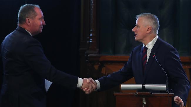 Deputy PM Michael McCormack (right) shakes hands with his predecessor, Barnaby Joyce, at a National Drought Summit in Canberra last weekend. Picture: Kym Smith