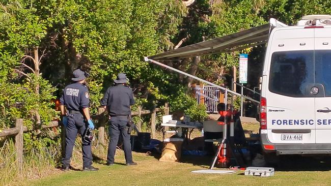 Forensic police at the Coffs Harbour scene where the human remains of an unidentified woman aged between 50 and 60 were found. Picture: Toni Moon.