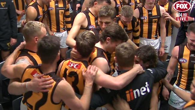 Sam Mitchell consoles his players following their devastating semi-final loss.