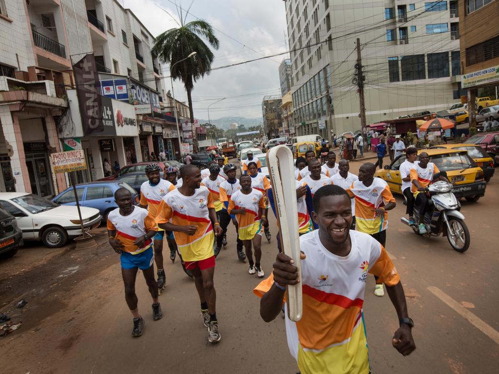 The Queen’s Baton was relayed through the streets, carried by assorted athletes, before attending an event at the City Hall, in Yaounde, in Cameroon, on 30 March 2017.