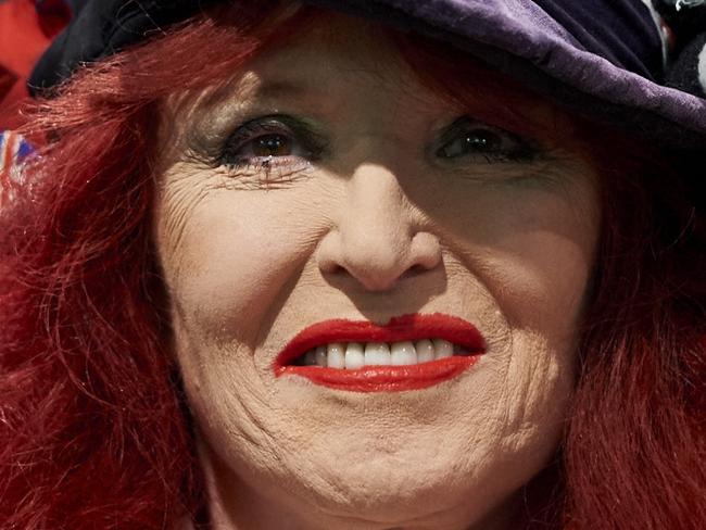 A pro-Brexit campaigner smiles at a public meeting by pro-Brexit campaigners central London on February 19, 2016. / AFP PHOTO / NIKLAS HALLE'N