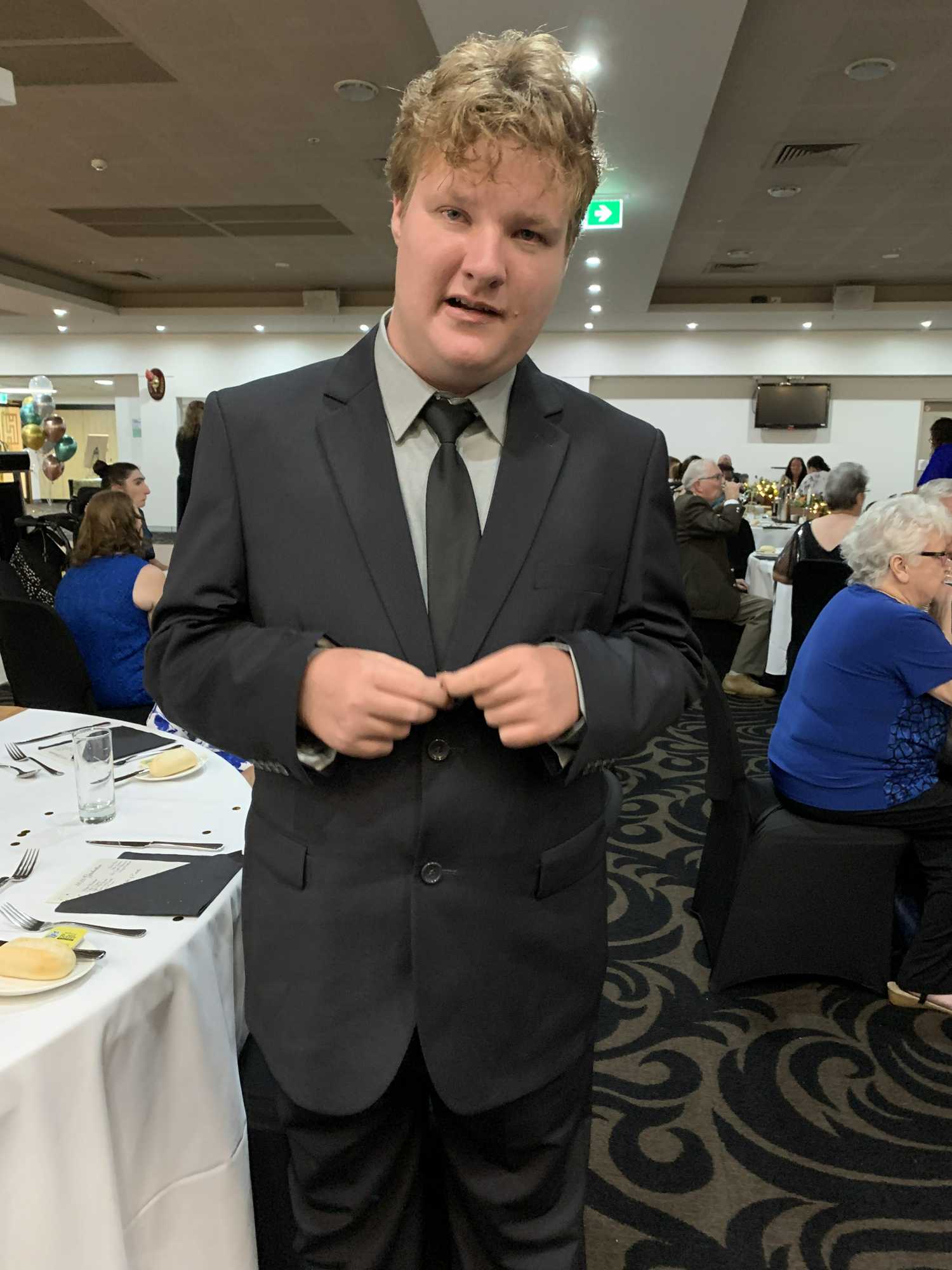 Graduating students from Hervey Bay Special School celebrate their formal.