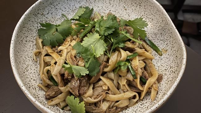 Master stock duck with house noodles at Southside restaurant in South Brisbane.