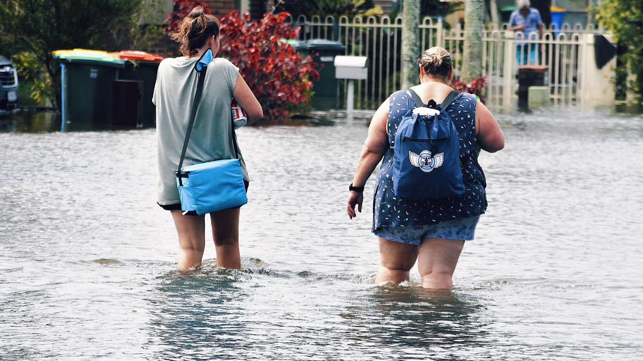 WEST BALLINA: Residents flee West Ballina after torrential rain causes flash flooding on Monday March 30, 2022. Picture: Tessa Flemming.