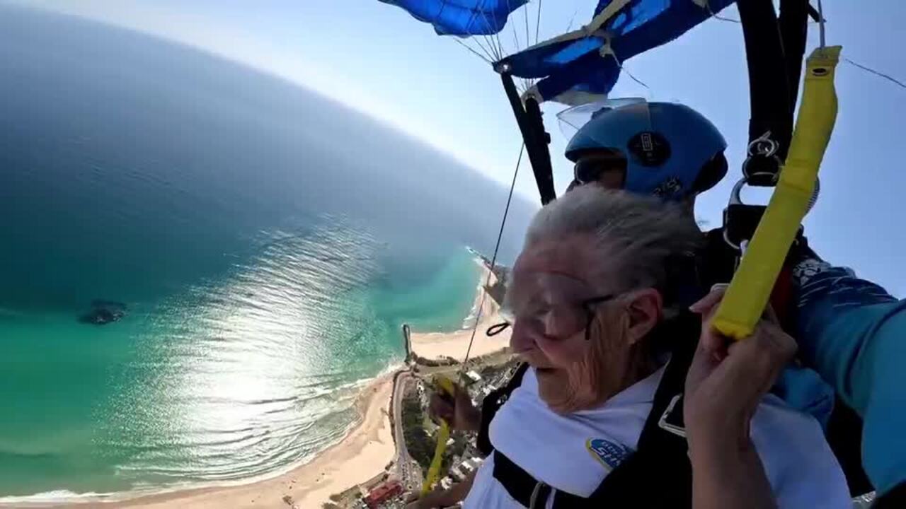 Great grandmother of 12 Betty Gregory jumps out of plane at 15,000 feet. Video: Gold Coast Skydive