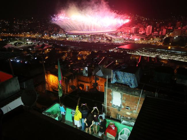 Getty Images Year in Focus 2016: Fireworks explode over Maracana stadium with the Mangueira 'favela' community in the foreground during opening ceremonies for the Rio 2016 Olympic Games on August 5, 2016 in Rio de Janeiro, Brazil. The Rio 2016 Olympic Games commenced tonight at the iconic stadium. Photo by Mario Tama/Getty Images