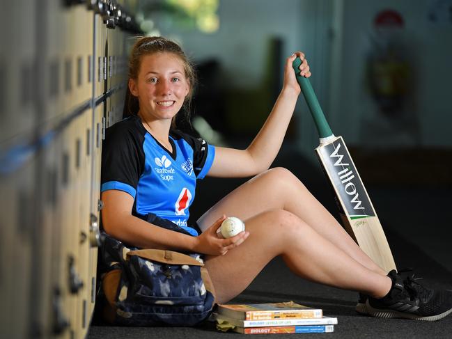 Darcie Brown, 16, pictured in the halls of Henley High School. She juggles schoolwork with her burgeoning cricket career. Picture: TOM HUNTLEY