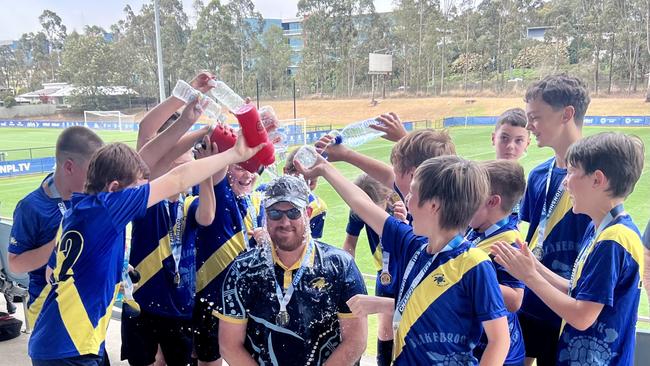 The Blakebrook Public School team celebrates the Sydney win.