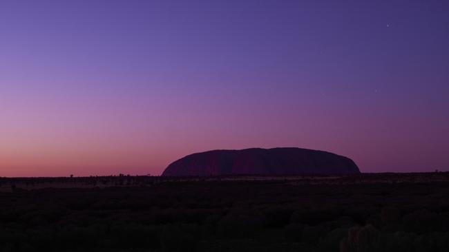 Uluru at sunrise. Picture: Voyages Indigenous Tourism Australia