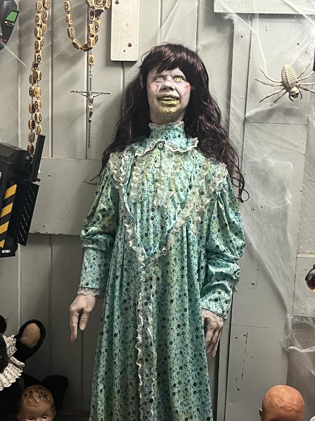 A doll version of the possessed Regan from The Exorcist.