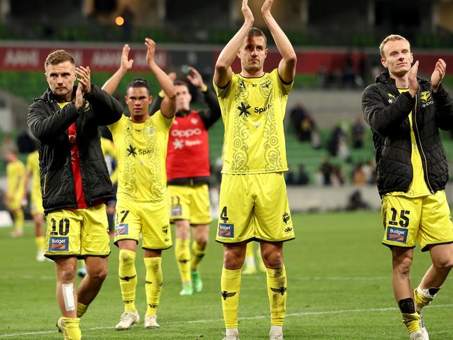 MELBOURNE, AUSTRALIA - MAY 12: Phoenix players thank their fans during the A-League Men Semi Final match between Melbourne Victory and Wellington Phoenix at AAMI Park, on May 12, 2024, in Melbourne, Australia. (Photo by Jonathan DiMaggio/Getty Images)