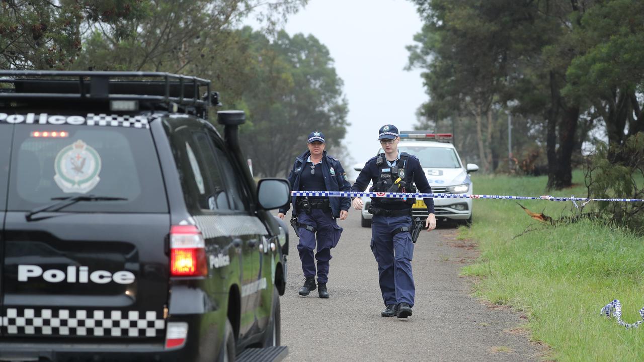 Police are seen on a farm in the Southern Tablelands region of Bungonia earlier on Tuesday. Picture: NCA NewsWire / Max Mason-Hubers