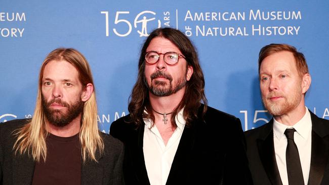 In this file photo taken on November 18, 2021, are Taylor Hawkins, Dave Grohl and Nate Mendel of US rock band the Foo Fighters at the The Museum Gala at the American Museum of Natural History on November 18, 2021 in New York City. Photo: KENA BETANCUR / AFP