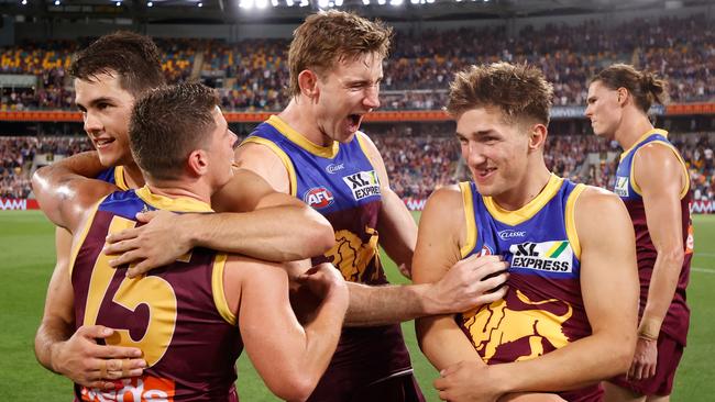 Andrews celebrates with teammates after knocking the Tigers off in the qualifying final. Picture: Michael Willson/AFL Photos