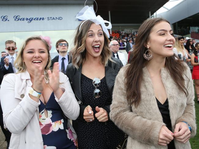 Ellie Bews, Alyssa McGuire and Erika Holmes cheer on their horse. picture: Glenn Ferguson